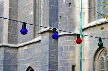 Low Angle View of Illuminated Light Bulbs Hanging in Building