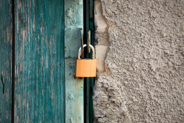 Golden metal lock on the door
