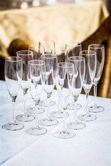 Empty glasses set in restaurant. Part of interior