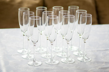 Empty glasses set in restaurant. Part of interior