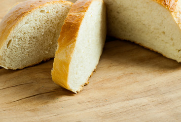 Fresh bread close up on wood desk