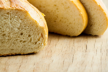 Fresh bread close up on wood desk