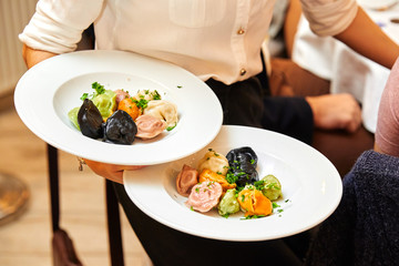 colored dumplings and spices on a light background.