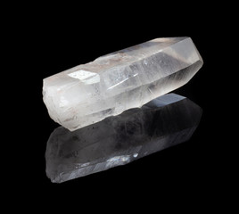 Natural quartz crystal rhinestone on a black background