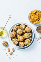 Raisins almond honey bliss balls. Top view, space for text.