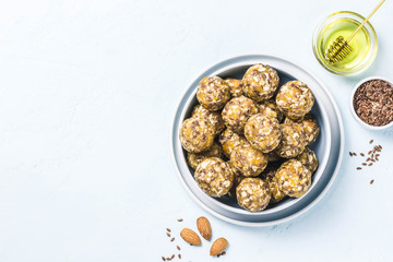 Raisins almond honey bliss balls. Top view, space for text.
