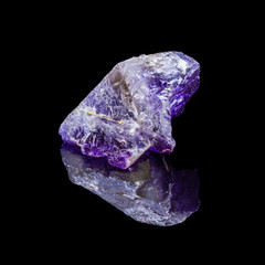 Natural untreated stone fluorite on a black backround