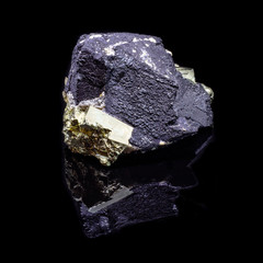 Natural cube pyrite on a black backgrond