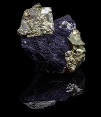 Natural cube pyrite on a black backgrond