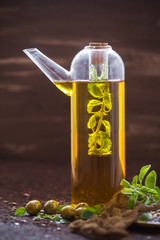 bottle filled olive oil addition sprigs herbs