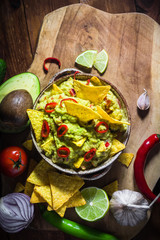 bowl guacamole chips ingredients tomato chilli pepper lime onion garlic dill