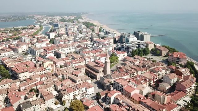 Aerial approach of Basilica in Grado, Italy.