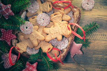 Christmas basket full dumplings Sweet cookies wooden table