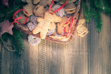Christmas basket full dumplings Sweet cookies wooden table space text