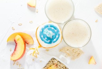 Housemade oat milk fruit nectarines white arrangement top view