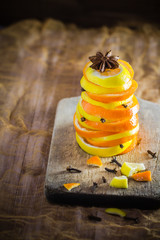 Pyramid emon orange slices cloves cinnamon Spices citruses delicious warming tea