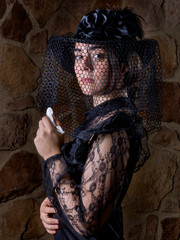 Young widow, she cries inconsolably