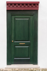 Obraz na płótnie Canvas old green wooden door