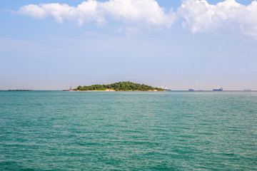 Desert Island Blue Paradise. Tropical island. Amazing beach background for summer travel and vacation concept design. Beautiful blue sea and relaxing beach scene and tranquil palm trees