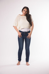 White caucasian girl posing emotionally isolated on background