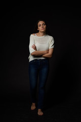 White caucasian girl posing emotionally isolated on background
