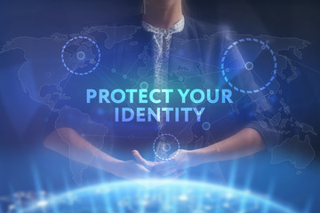 The concept of business, technology, the Internet and the network. A young entrepreneur working on a virtual screen of the future and sees the inscription: Protect your identity