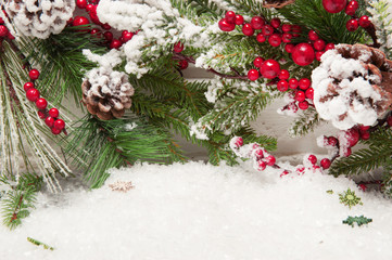 Christmas background with artificial snow and Christmas tree branches