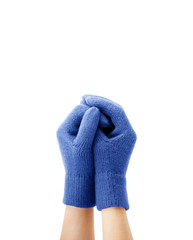 Hands in warm woolen gloves on a white background
