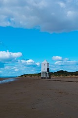 Burnham  on sea  light house  on beach 
