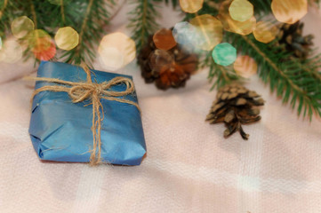 Fototapeta na wymiar gift in blue packaging close-up