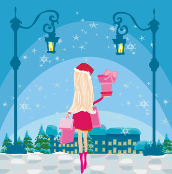 Beautiful girl on winter shopping, card