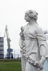 Fototapeta na wymiar statue in industrial landscape