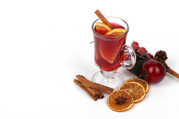 Winter hot drink with spices isolated on white background
