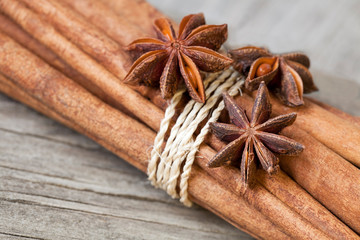 Fototapeta na wymiar Bundle of cinnamon sticks with star anise