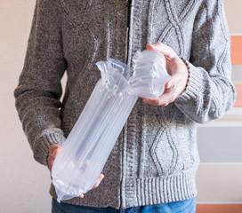 translucent air packaging hands hold, plastic packaging
