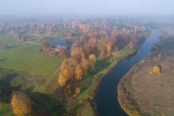 A foggy October morning over the Trigorskoe (shooting from a quadrocopter). Pushkin Mountains, Russia
