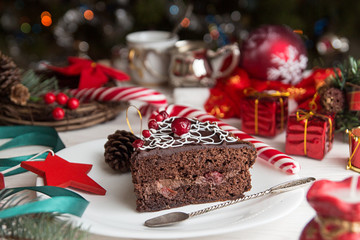 Slice of sweet chocolate cake for Christmas Eve.