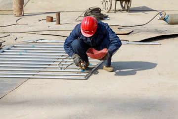 Electric welder welding work was in progress in a factory