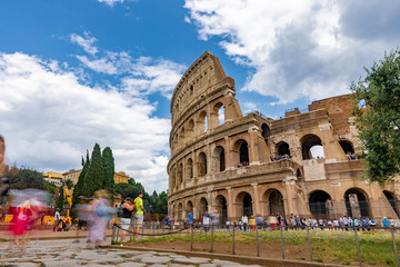 Fototapeta na wymiar Tourists Visiting The Colosseum in Rome Italy