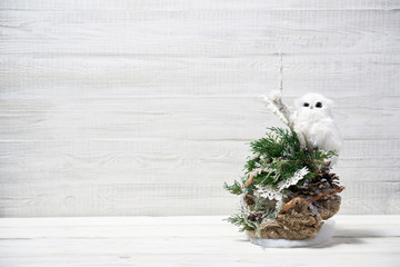 Naklejka na ściany i meble Festive composition of Christmas decorations on white wooden background.