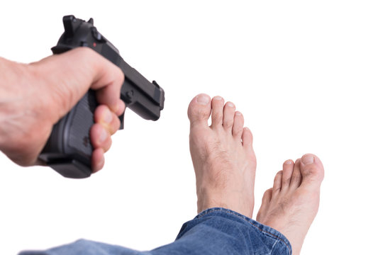 Man shooting himself in the foot