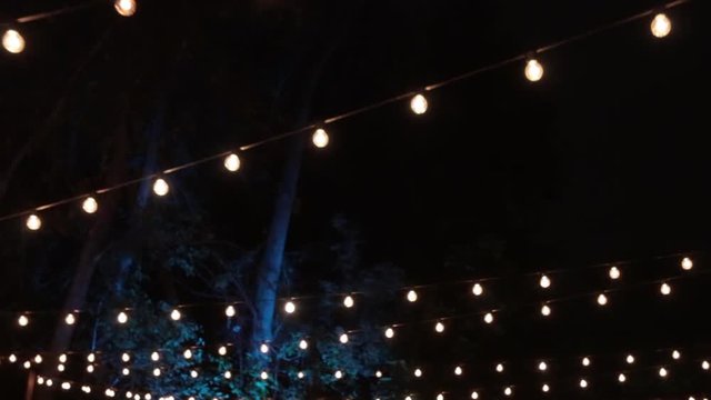 Hanging string light rows night