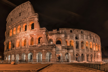 Coliseum in Rome by Night -  Colosseum is one of the main travel attractions - The Main symbol of Rome