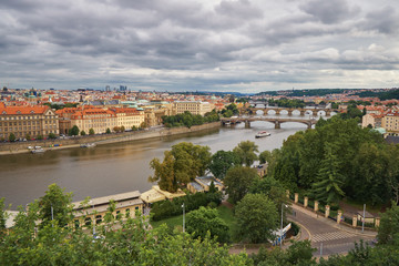 Fototapeta na wymiar Prague bridges and Charles bridge Vltava river with ships, capital of Czech republic medievil architecture historical landmark
