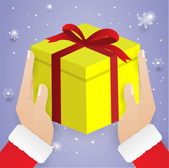 hand hold yellow gift box, christmas ,happy new year.