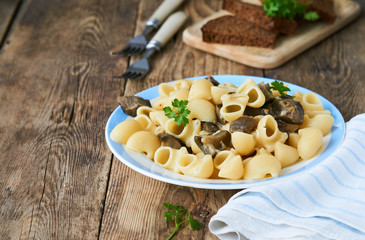 Pasta with baked eggplants on a plate