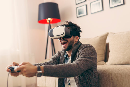 Man playing a virtual reality game