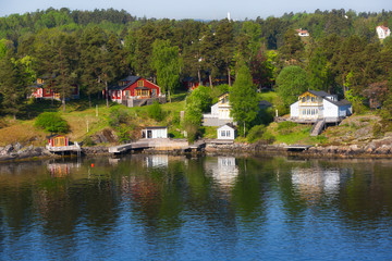 Finland, small houses on an island in the Baltic Sea
