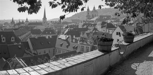 Prague - The outlook from the gardens under the Castle to Mala Strana, St. Nicholas, and St. Thomas church.