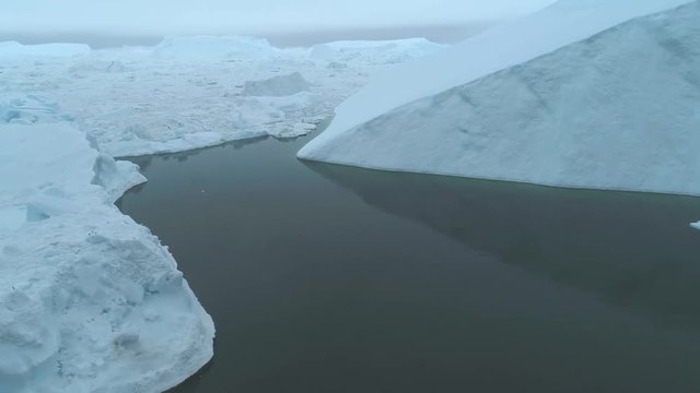 4k 60fps Greenland Aerial view before sunrise of Sermeq Kujalleq glacier Ilulissat disko bay